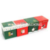 Angled view of printed Christmas gift box with festive designs