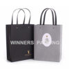 Custom retail paper gift bag with logo and handles