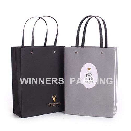 Custom retail paper gift bag with logo and handles