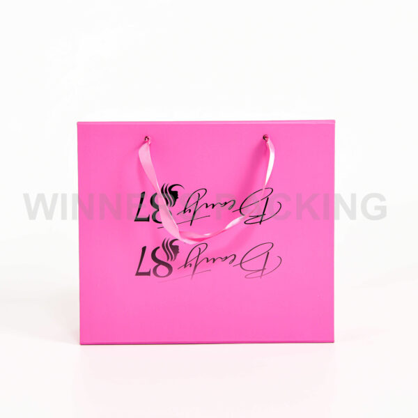 Collapsible pink gift box with satin ribbon and linen texture