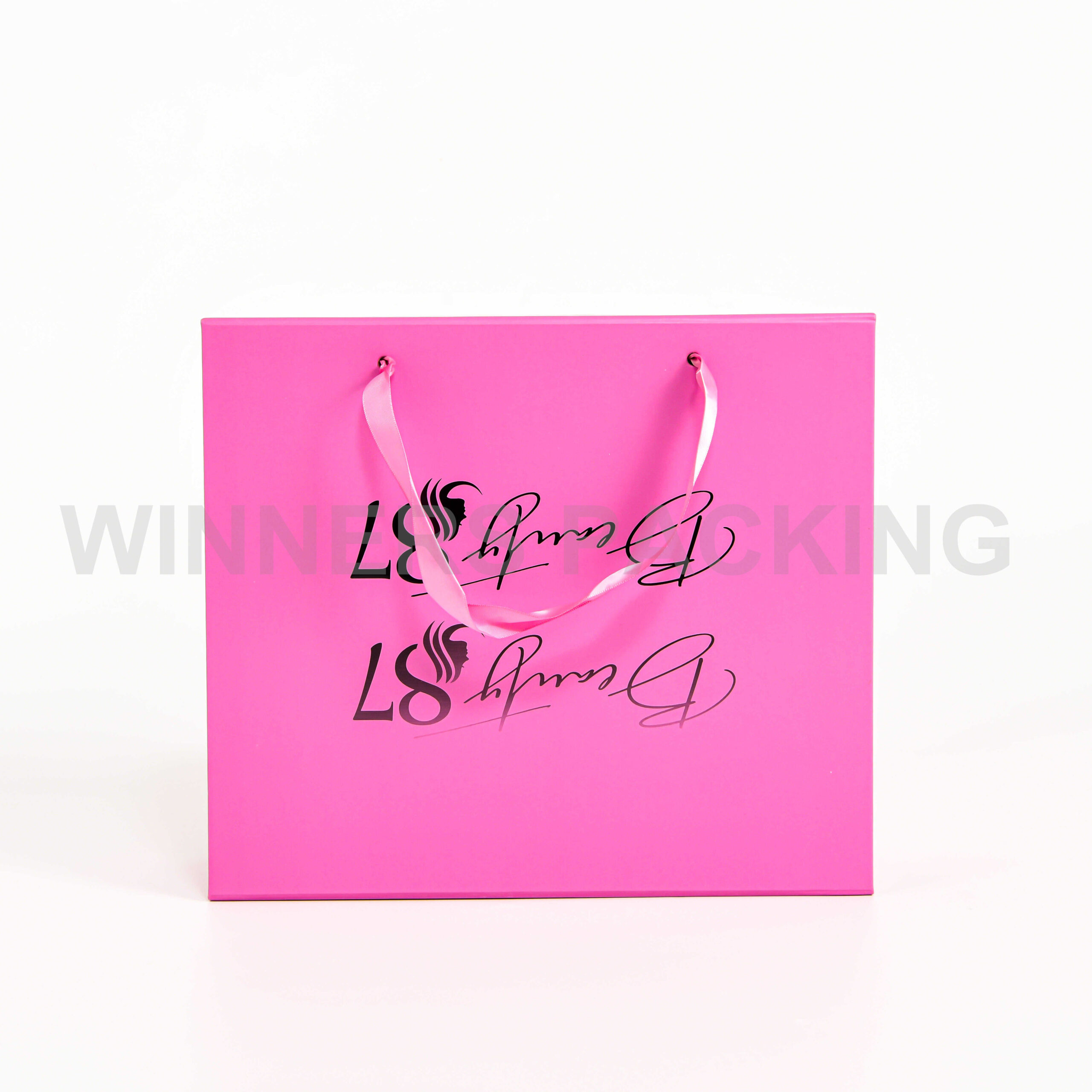 Collapsible pink gift box with satin ribbon and linen texture
