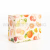 Side view of foldable gift box with fruit artwork