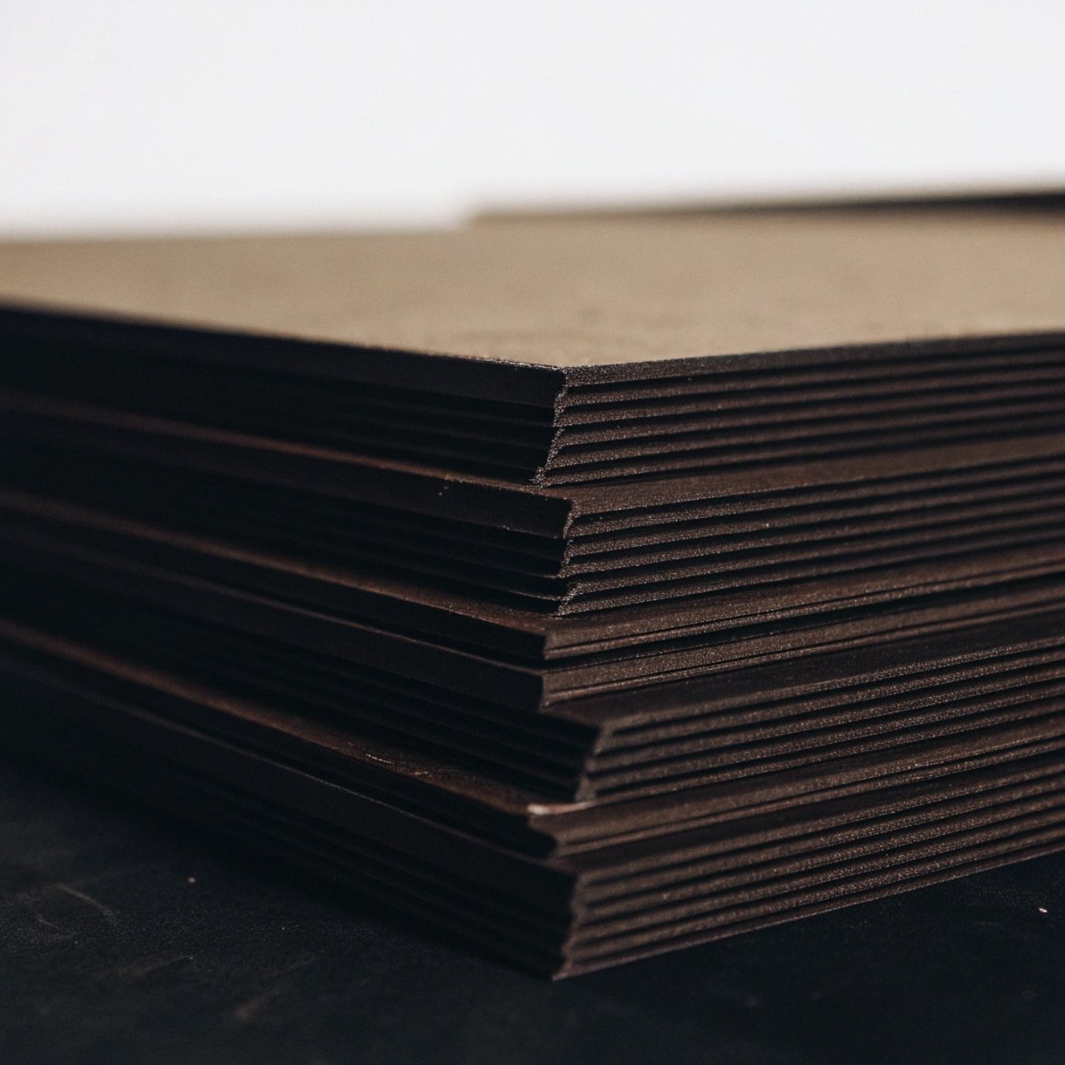 Different thicknesses of grey cardboard for rigid boxes